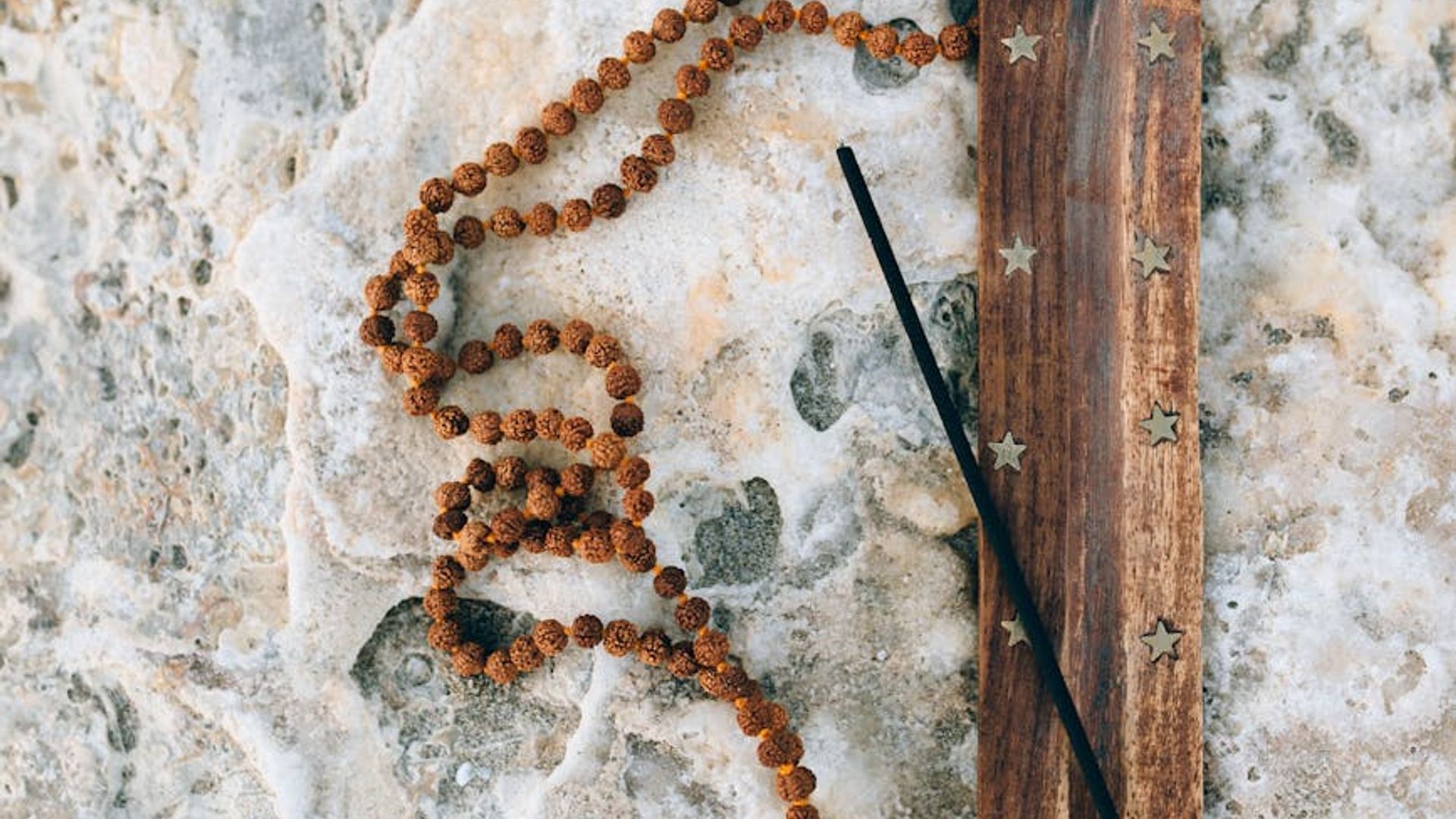 Serene woman in a calm yoga space, embodying balance and tranquility.